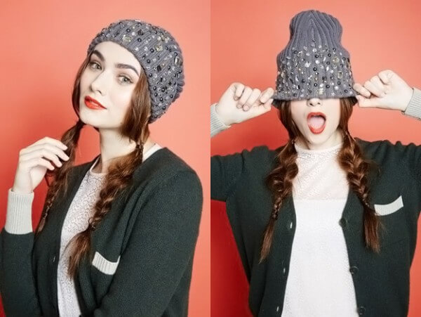 Hairstyle under beanie divide the hair into two parts and form two pigtails 