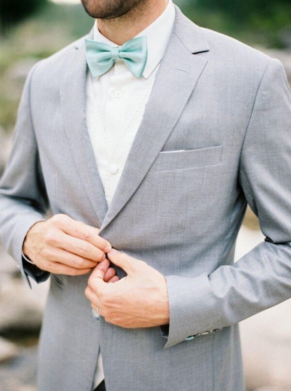 Men's grey suit, white shirt & blue bow tie for any occasion