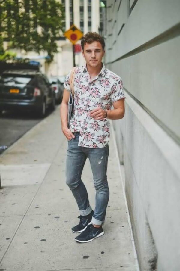 Men's white floral shirt combination with denim jeans and blue shoes for street style