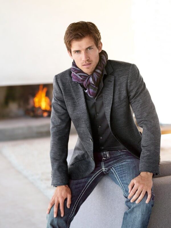 Men's fancy multicolor scarf with grey coat and blue jeans for winter season