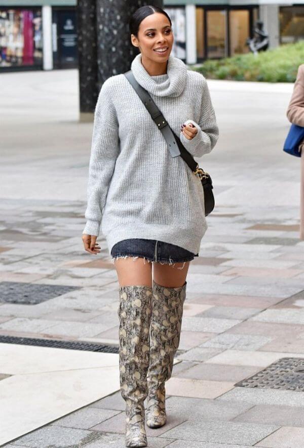 Women's high neck grey oversized sweater with printed thigh high boots 