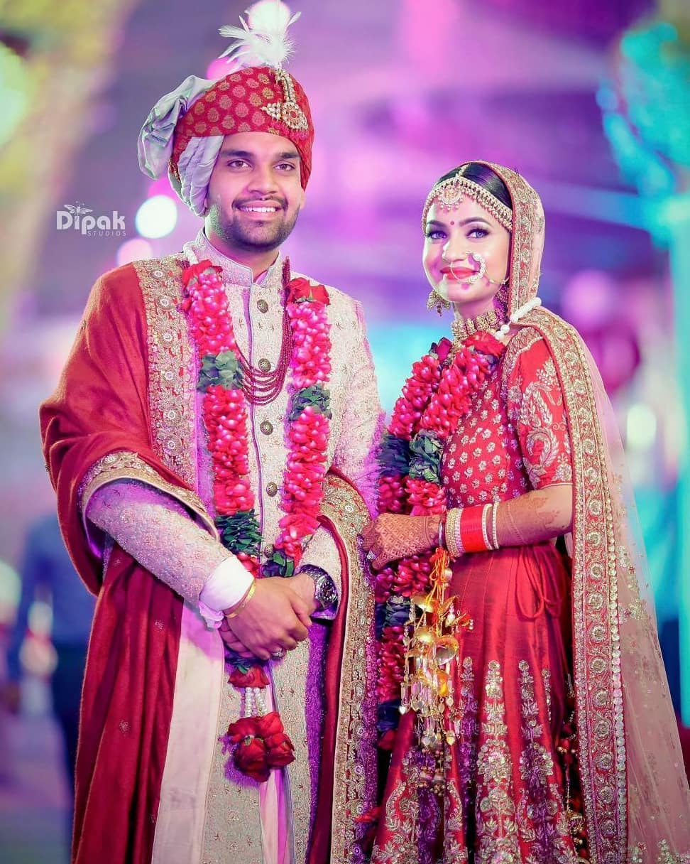 Matching lehenga with safa: Bride and Groom Wedding Dress Colour Combinations