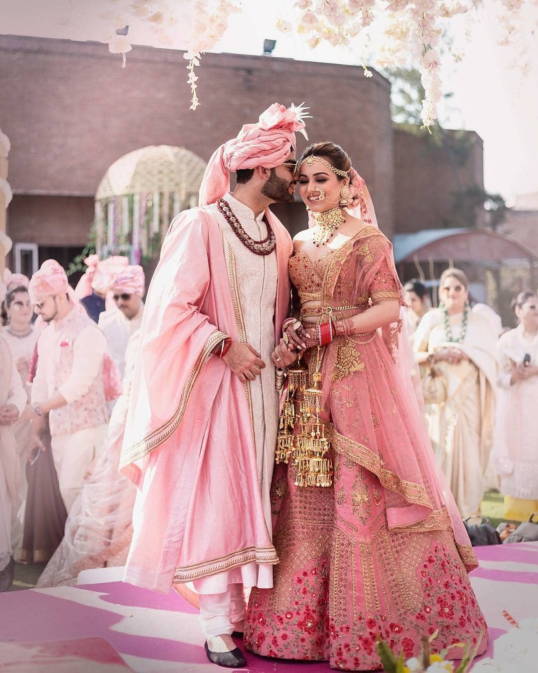 Powder pink and blush pink combination: Bride and Groom Wedding Dress Colour Combinations