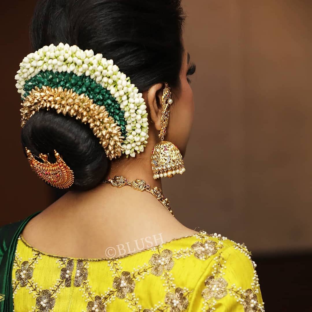 Multi-layered: Floral Bun Hairstyles for Brides this Wedding Season