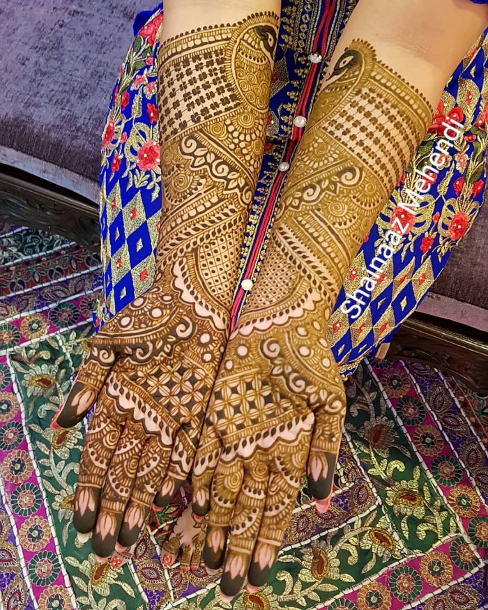 Beautifully pannelled pecock bridal mehndi design for hands Bridal Front Hand Mehndi Designs from Shainaaz Mehendi