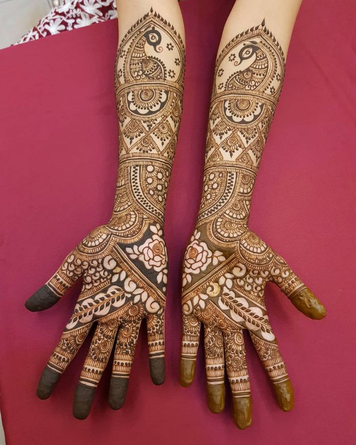 Peacocks and flowers combonation bridal mehndi design for hands Bridal Front Hand Mehndi Designs from Shainaaz Mehendi