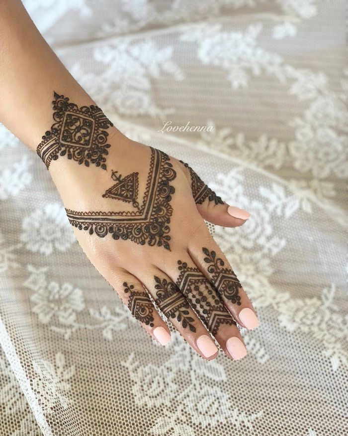 Beautiful geometrical mehndi designs for back hand for bride Mehndi Designs for Back Hand from Farah Saye