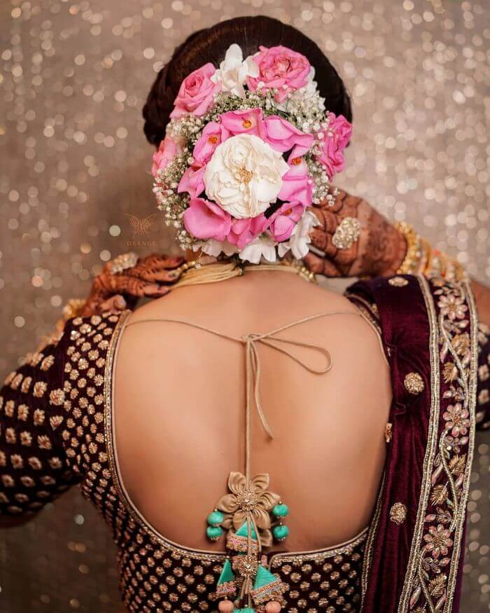 The combination flower bun design Bridal Floral Bun Hairstyles for Wedding Day