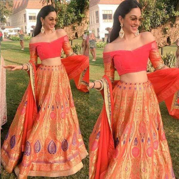 A mesmerizing coral brocade lehenga with an off-shoulder blouse by Manish  Malhotra - K4 Fashion