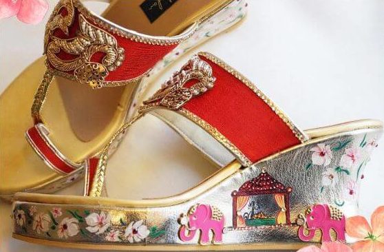 Very beautiful embroided elephants and doli made at the heel and the stone work on the strap footwear for gilrs