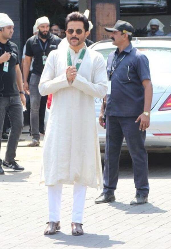 Anil Kapoor simple self-designed white or off-white kurta paired with contrasting haar