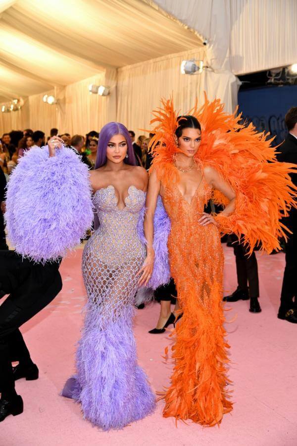 Kendall and Kylie Jenner Met Gala 2019 in coordinated Versace gowns with feathers detailing