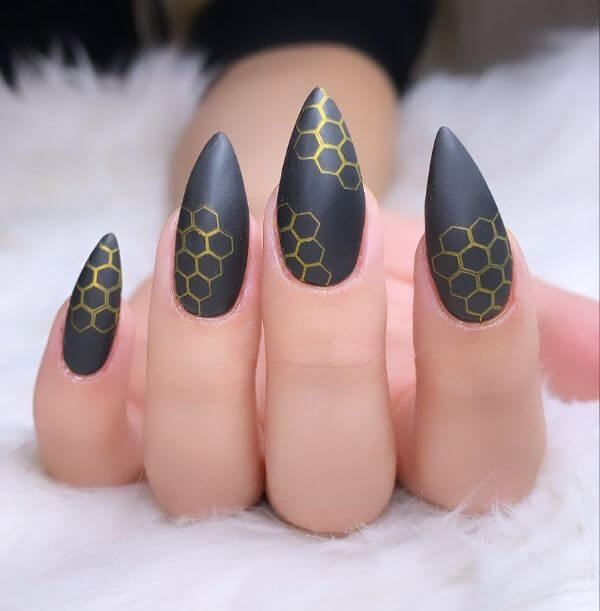 Black color nail art with some golden art on it for girls Matte Nail Art Designs - Nail Polish Ideas for Stylish Look
