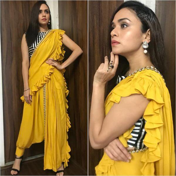 Amruta Khanvilkar in frilled indo-western couture yellow saree - Yellow Sarees For Haldi Ceremony 