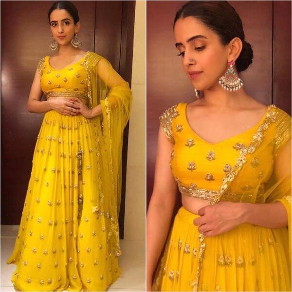 Sanya Malhotra's yellow lehenga, paired with multi colour jhumkas