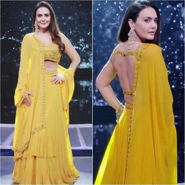 Preity zinta's deep square cut-out blouse with gold embellishments and bright yellow lehenga choli