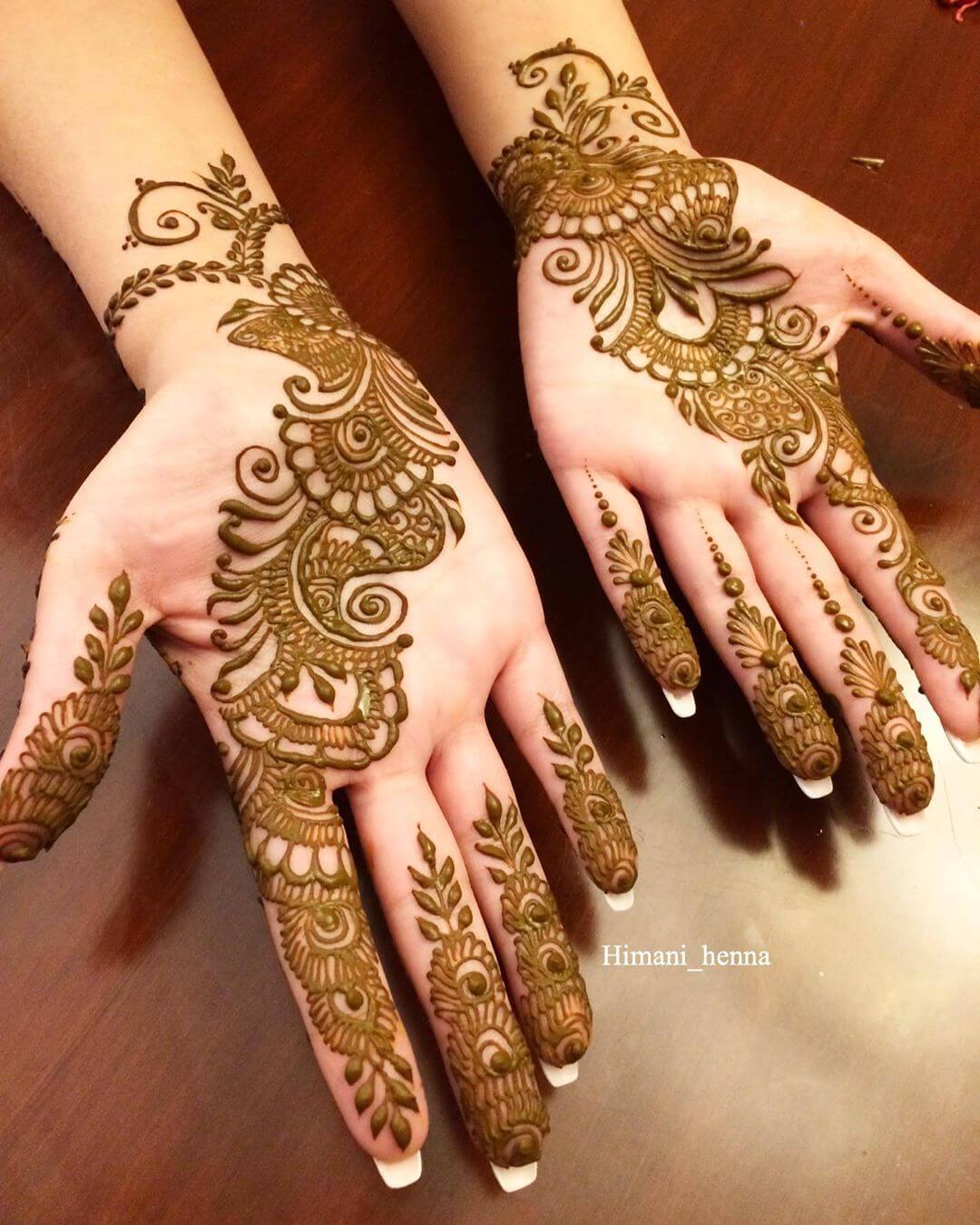 Paisley and leafy arabic mehndi design Flowing trail mehndi designs Mirror arabic mehndi designs Arabic mehndi designs for Palm