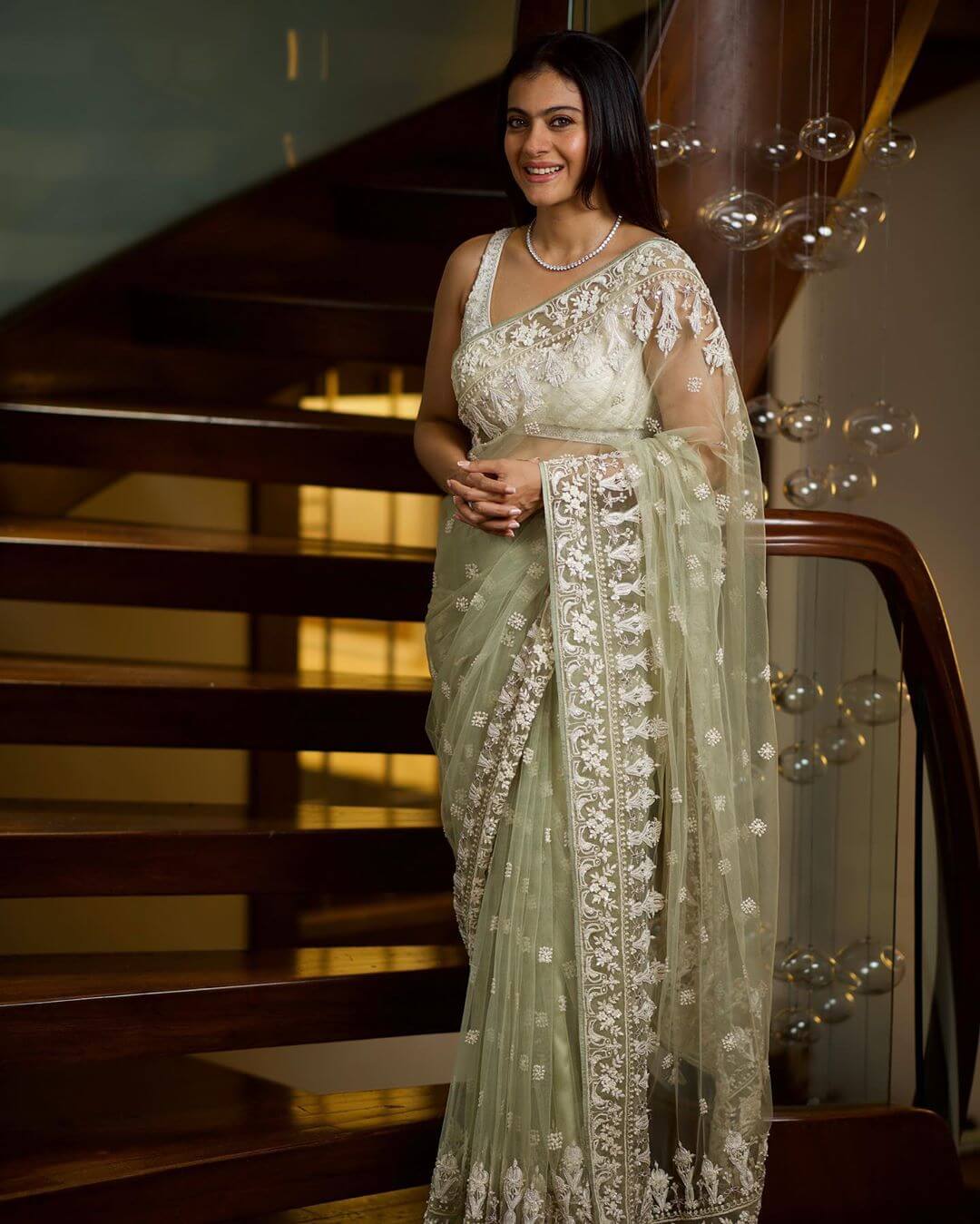 Pastel green saree with white embroidery