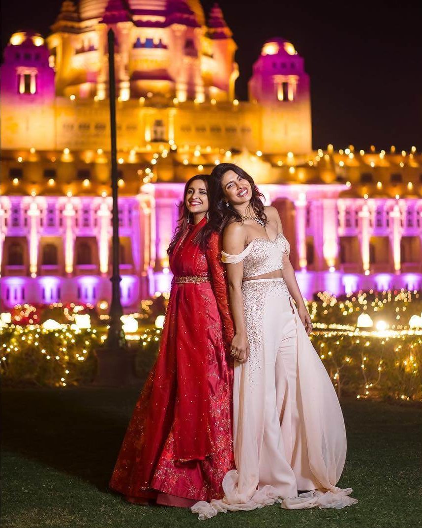 Red Lehenga with belt detailing Indian Bridesmaid Dresses | Celebrity Wedding Dress Inspirations