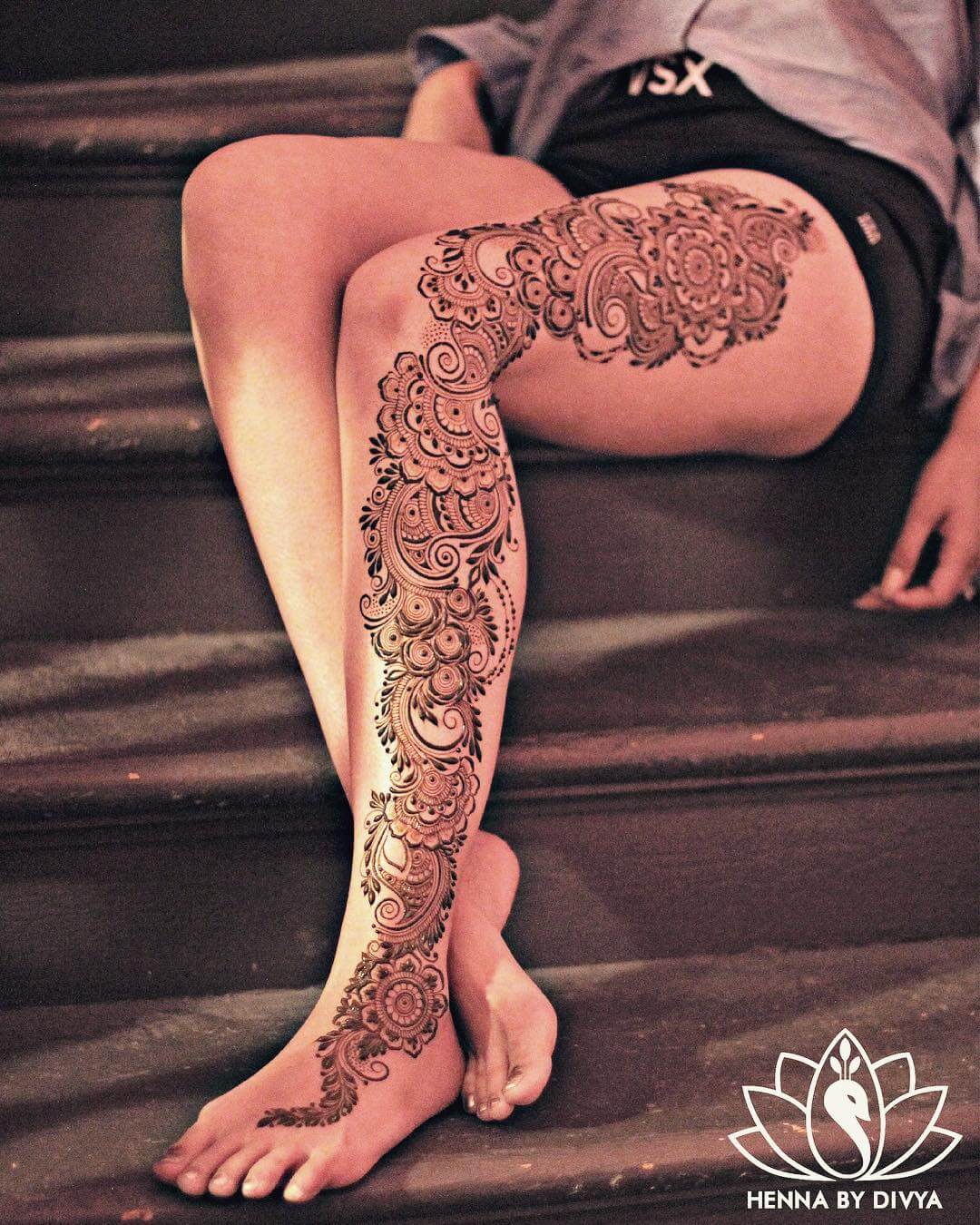 Intricate mandala leg mehndi design