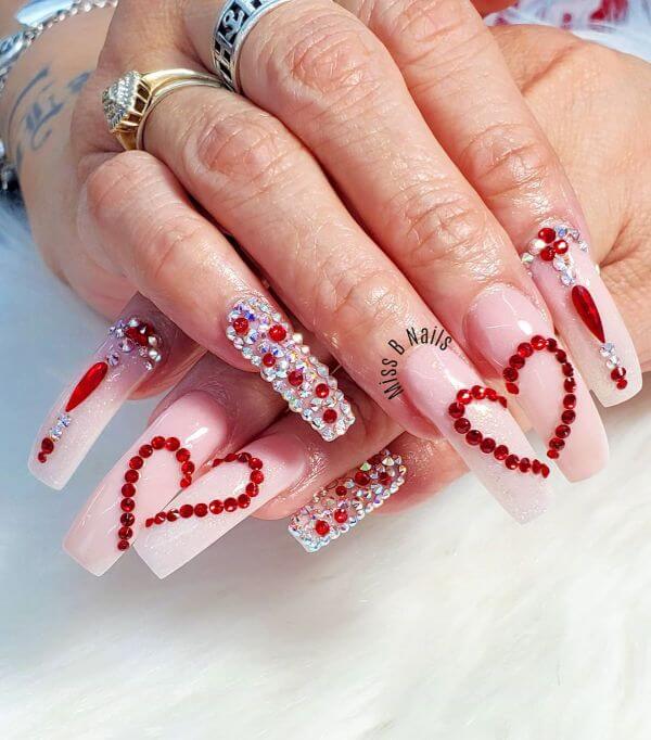 3D Nail Art Using Silver and Red Rhinestones