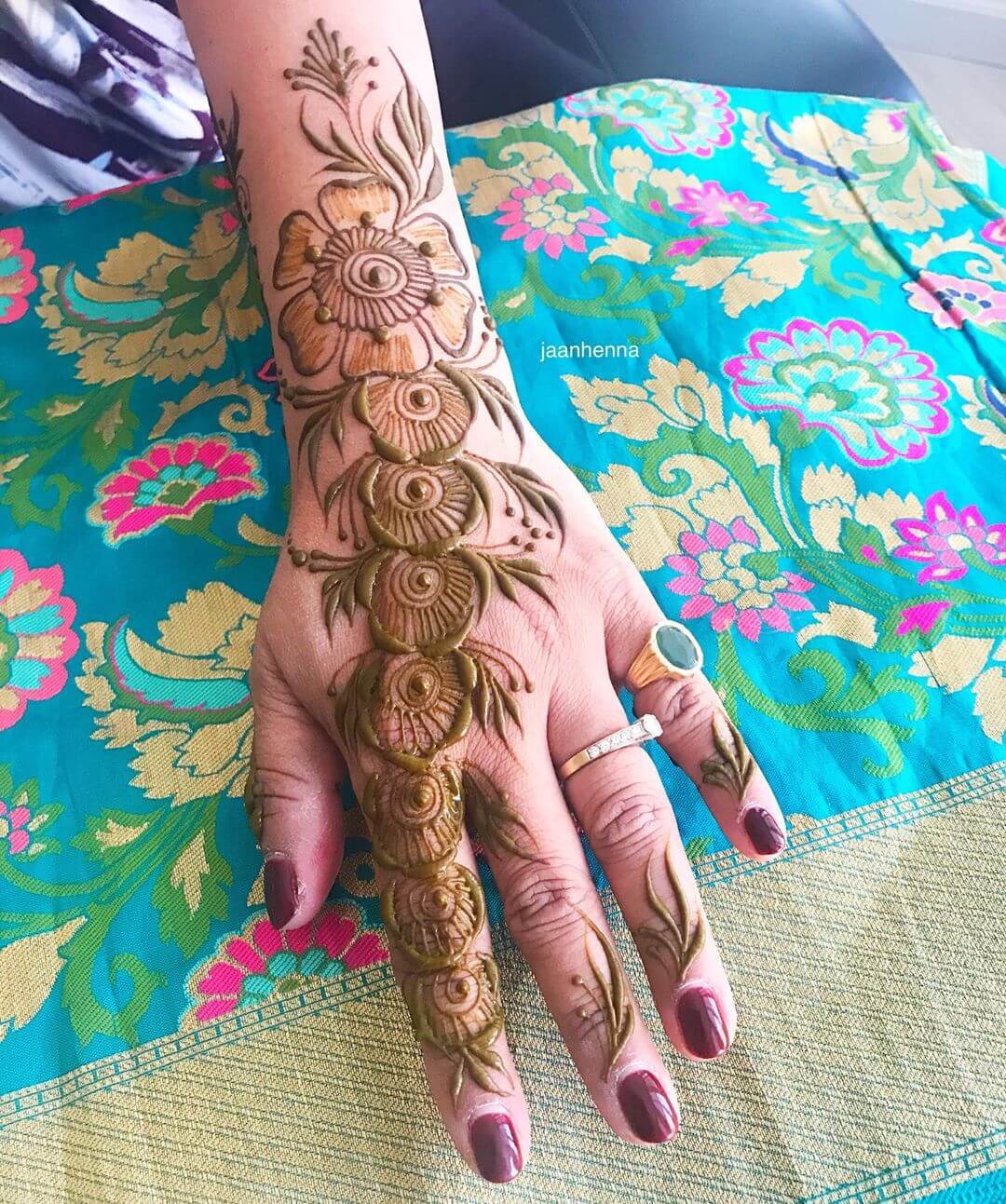 Repeated Designed Trails Shaded Mehndi Designs for Back Hand