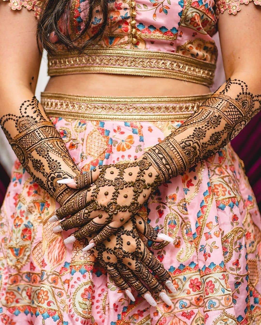 Exquisite Bridal Back Hand Mehndi Design