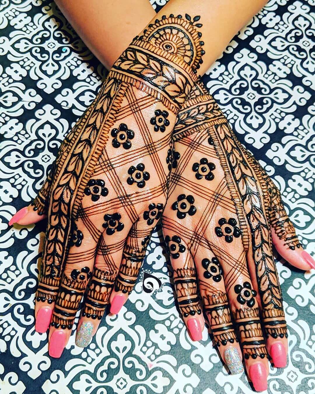 Floral And Leafy Motif Arabic Bridal Back Hand Mehndi Design