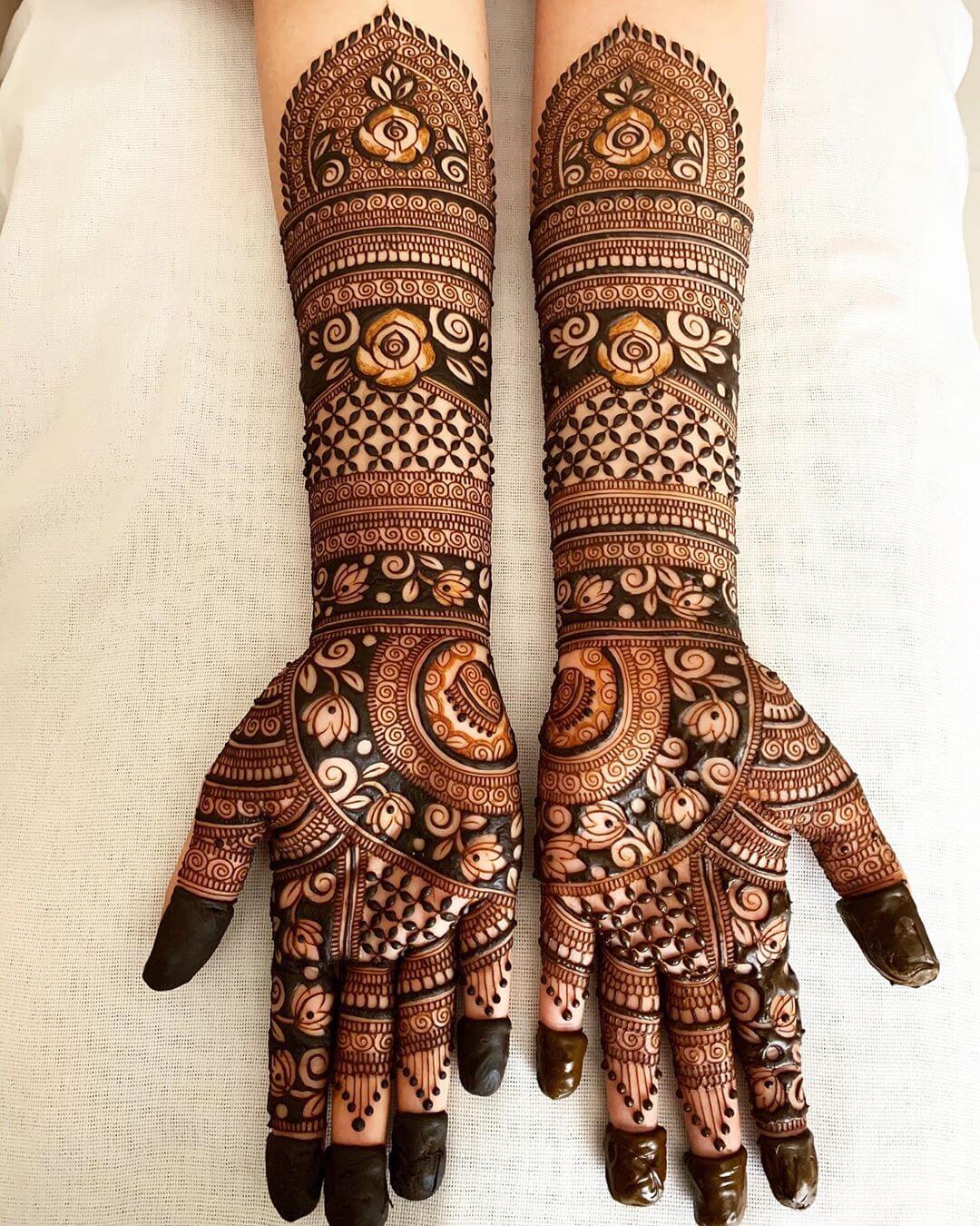 Bridal henna designs for both hands.