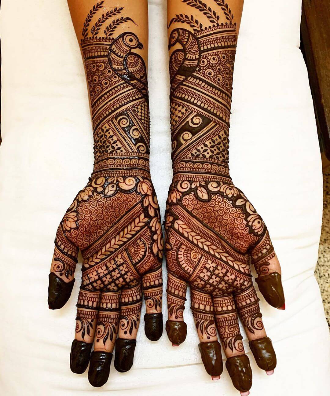 Bridal mehndi designs to cover the entire hands.