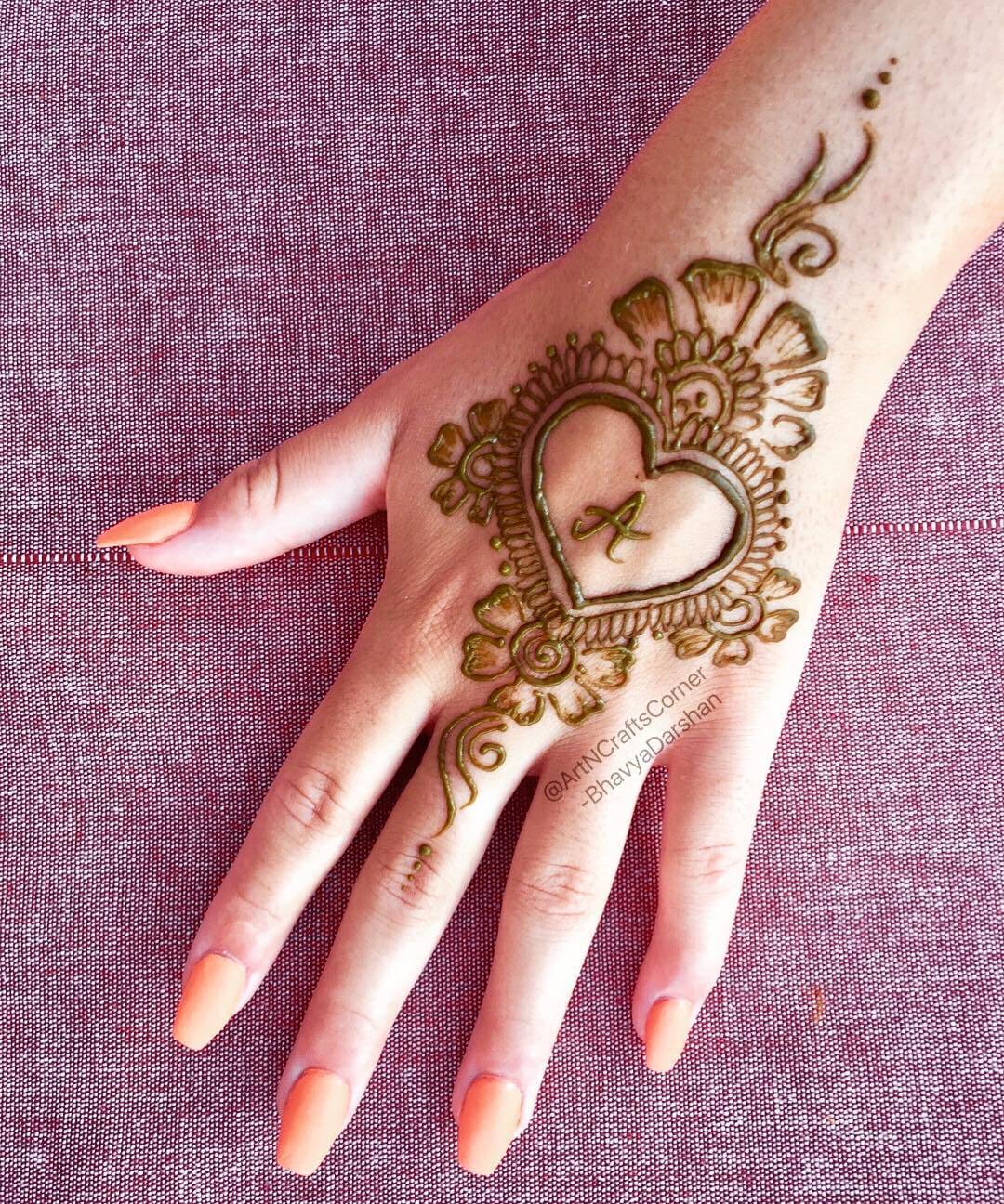 Cute heart mehndi heart design for back of the palm