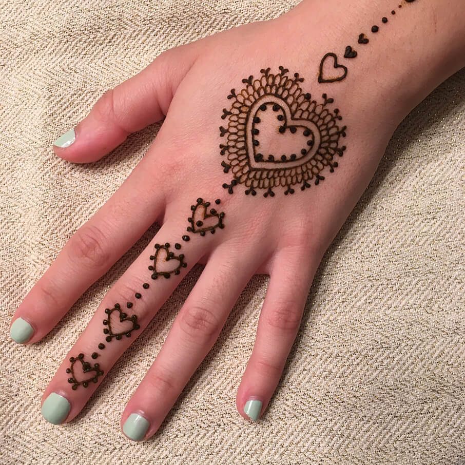 Simple heart mehndi design for back of the palm