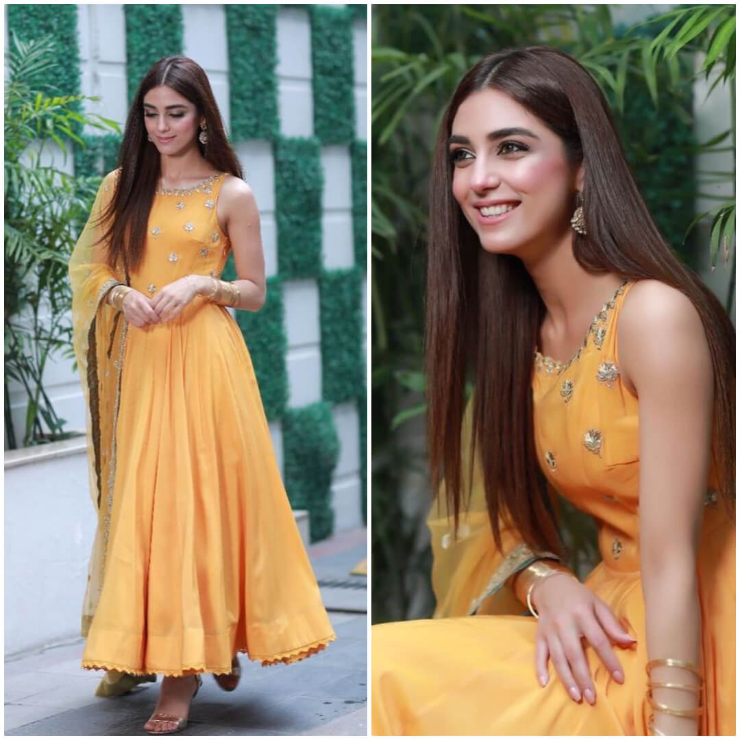 Maya ali Graceful Yellow Anarkali suit with a semi-transparent dupatta