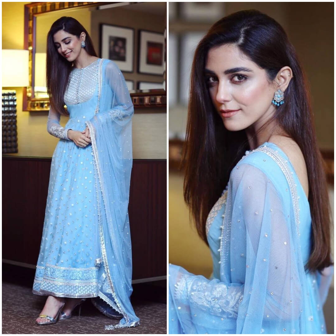 blue kameez with beautiful cross - stitches on maya ali suit with ravishing blue earrings.