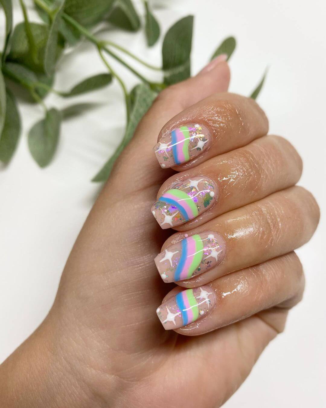 Two-toned sparkle rainbow designed nail art design