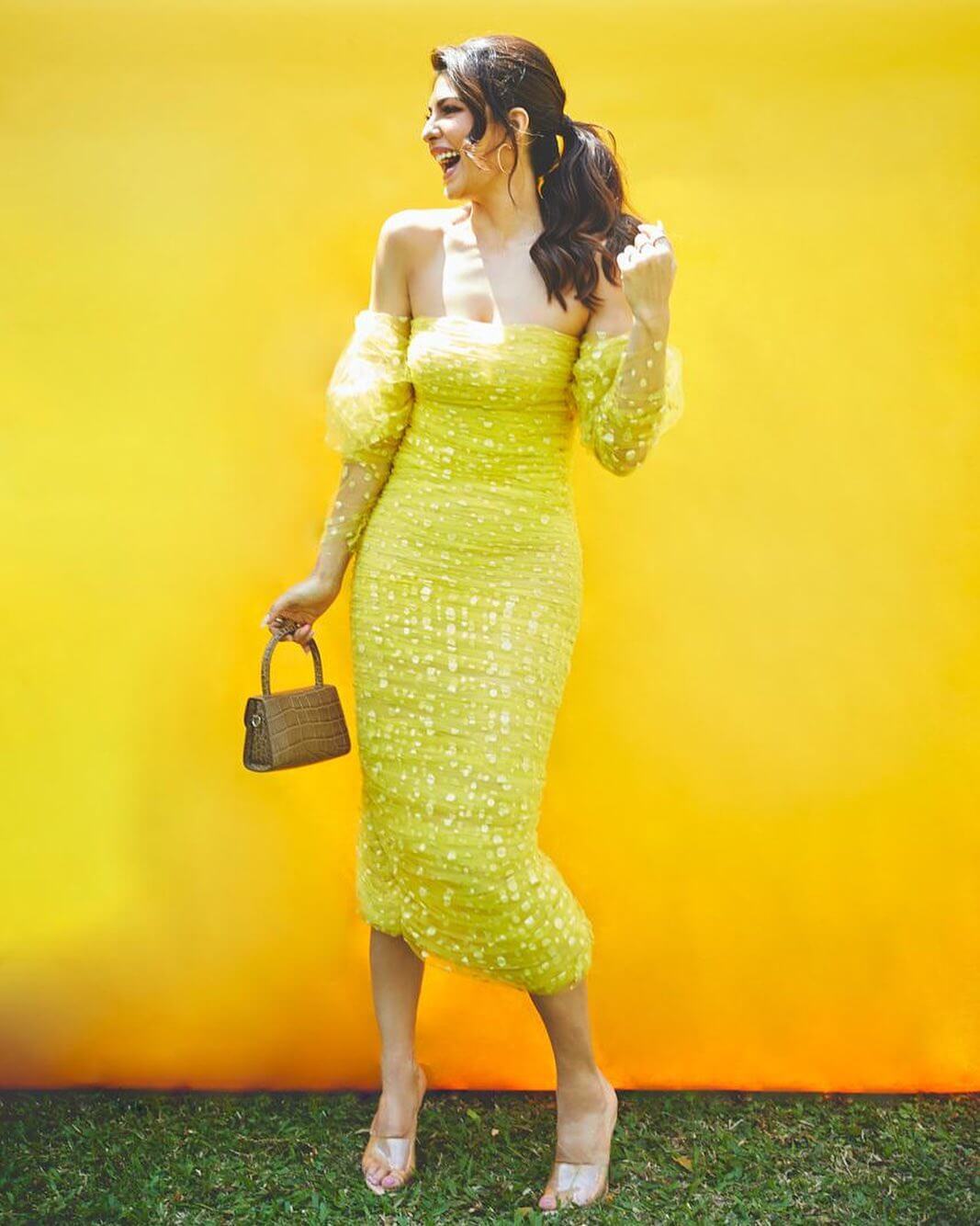 Jacqueline Fernandez Glow with shine Yellow Outfits for Summer