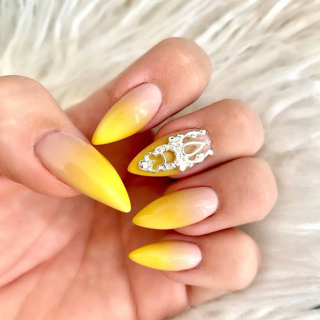 Fleeky yellow airbrush nail art design