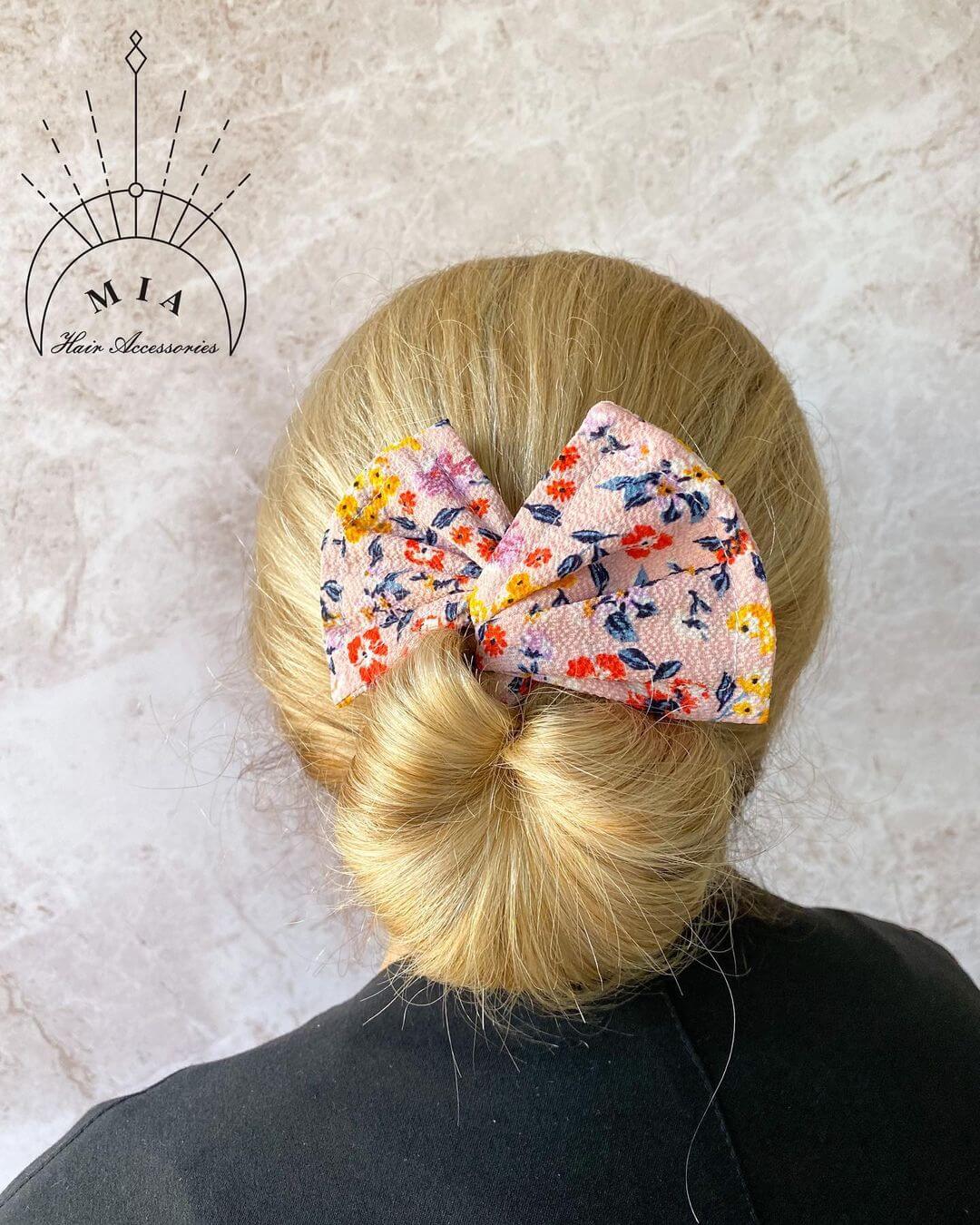  Different Bun Hairstyle that are Easy to Make Simple bun with bow style accessories