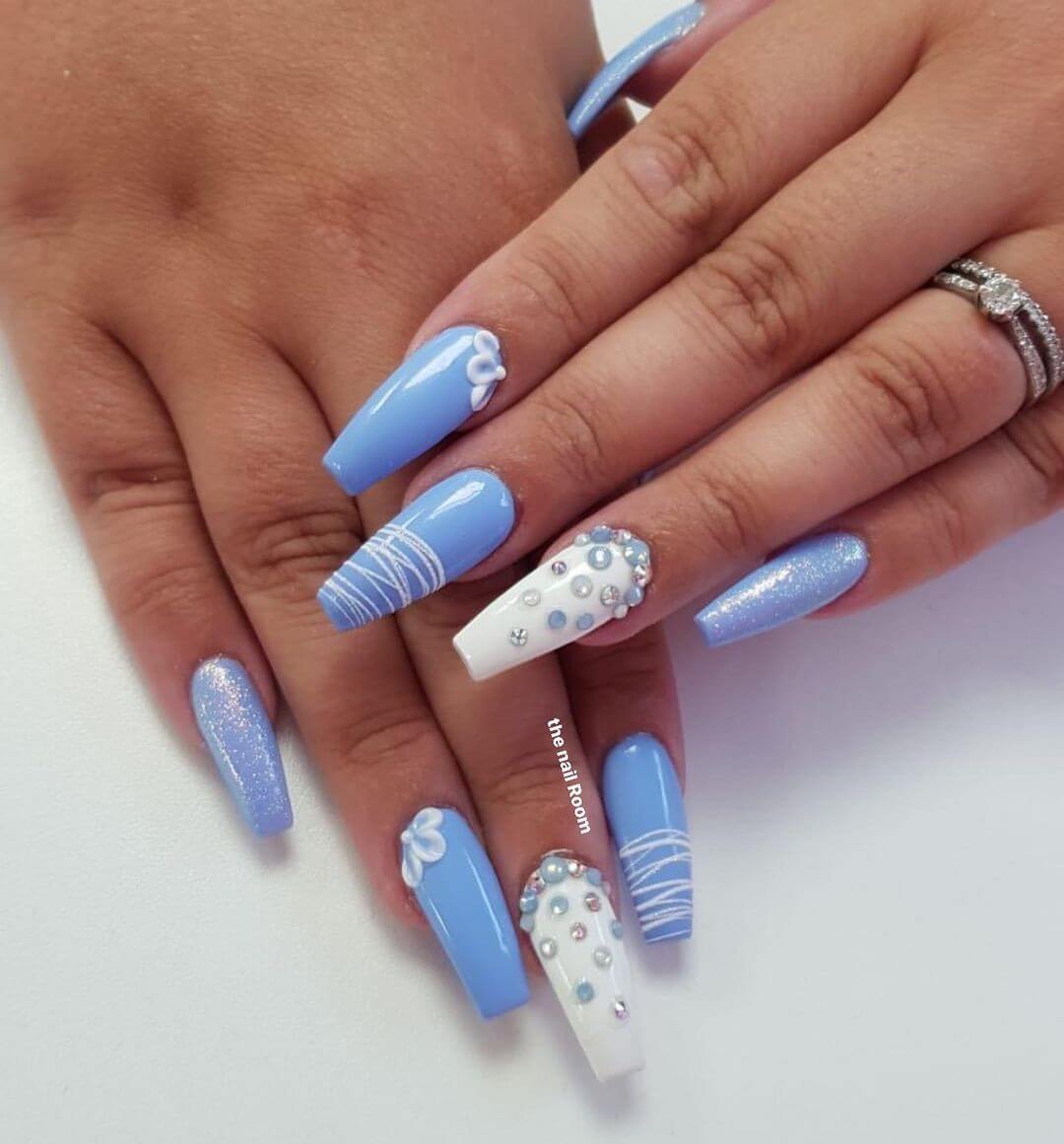 Pastel Blue Embellished Shiny Nail Art Design