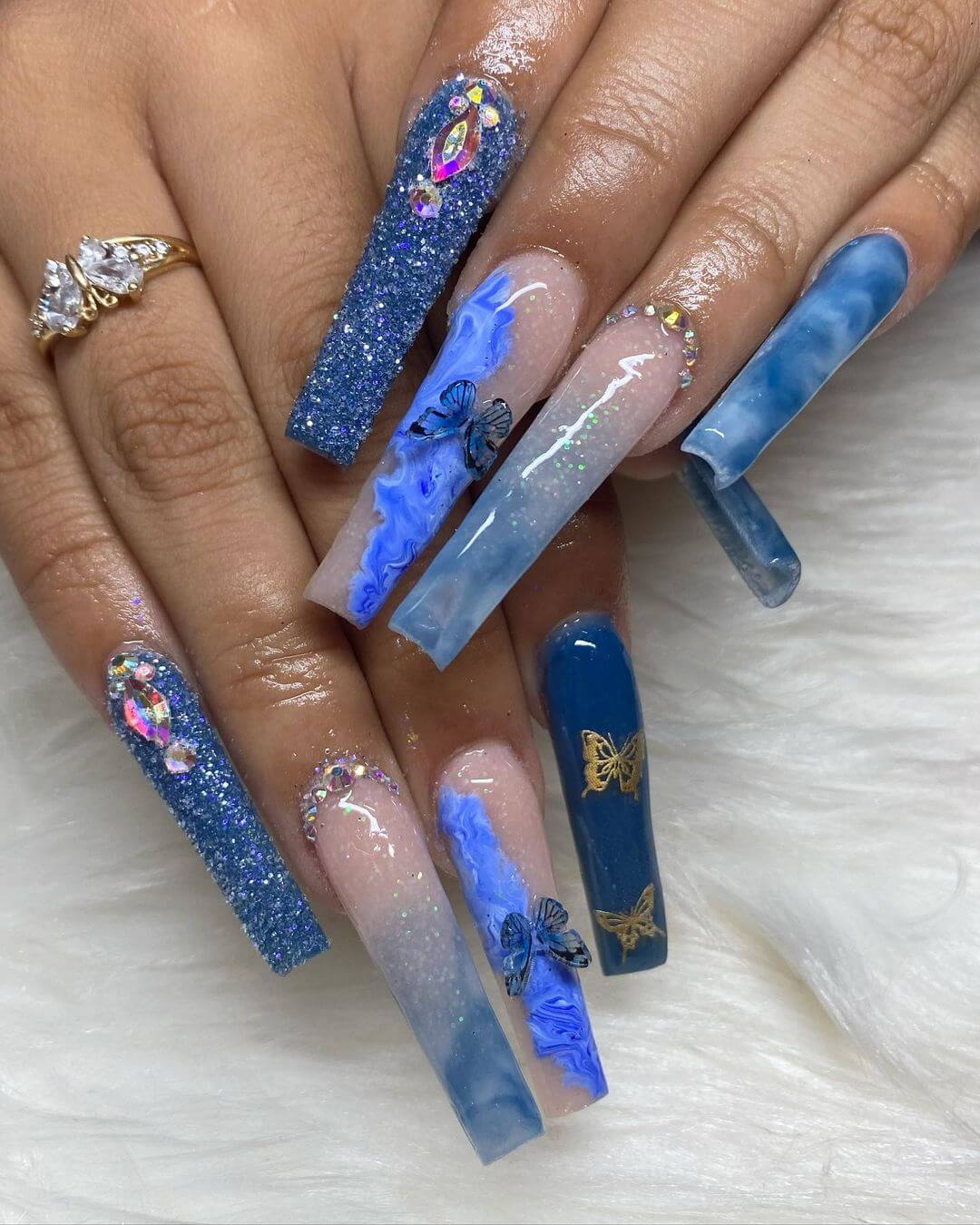 Vibrant blue shimmery nail art