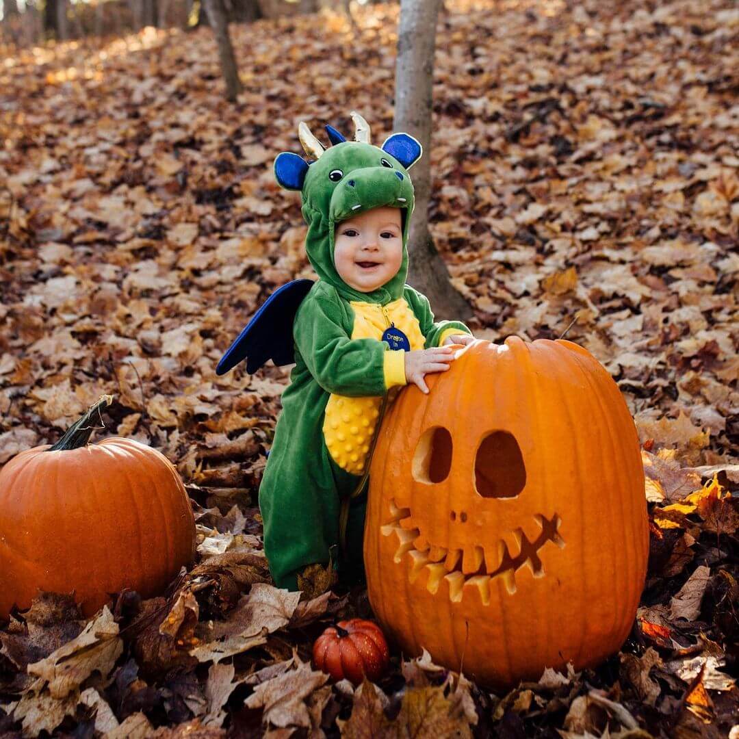 Halloween Photoshoot Ideas for Kids With a pumpkin witch theme, this will steal your heart