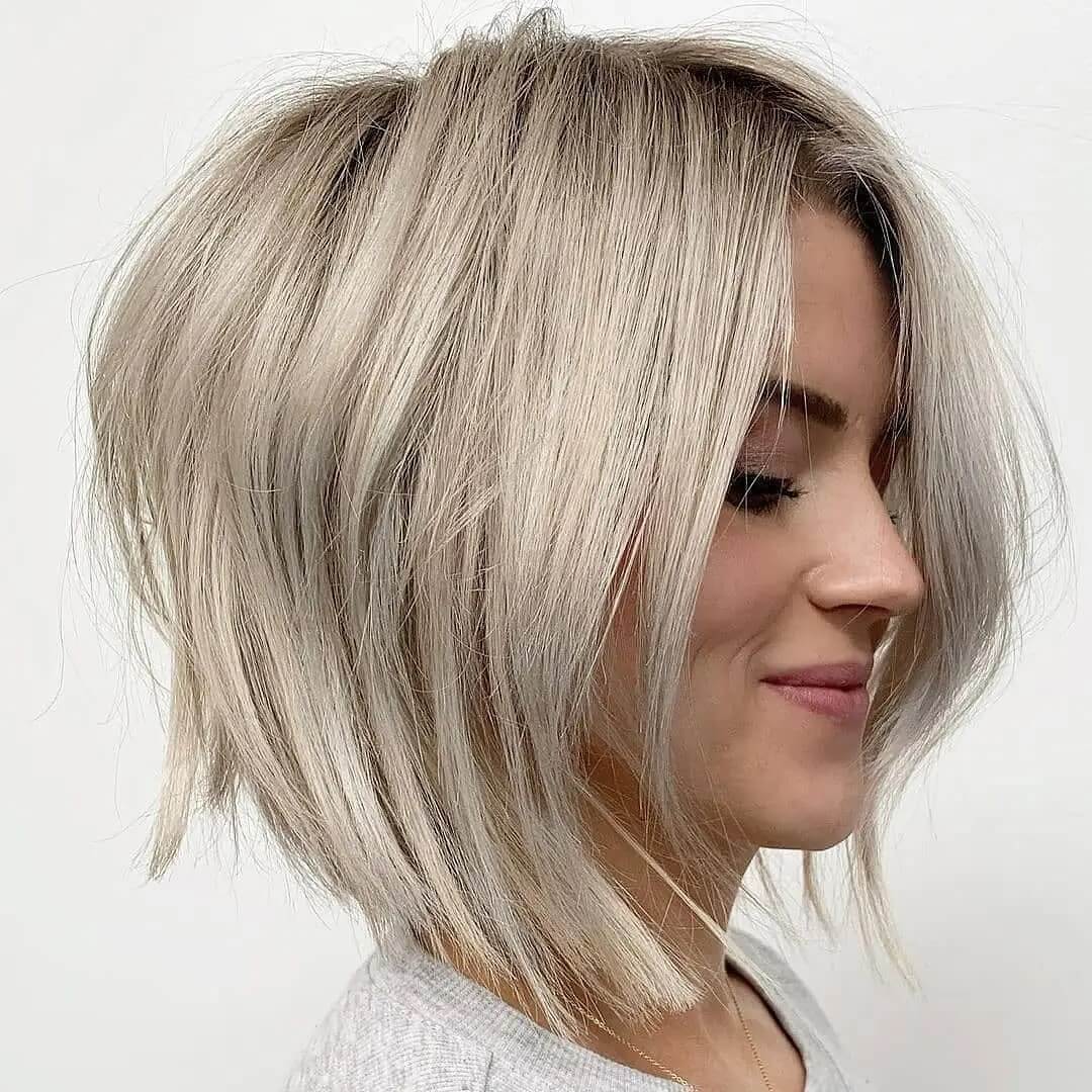 Medium haircuts for women over 40 Angled bob in blonde hairstyle