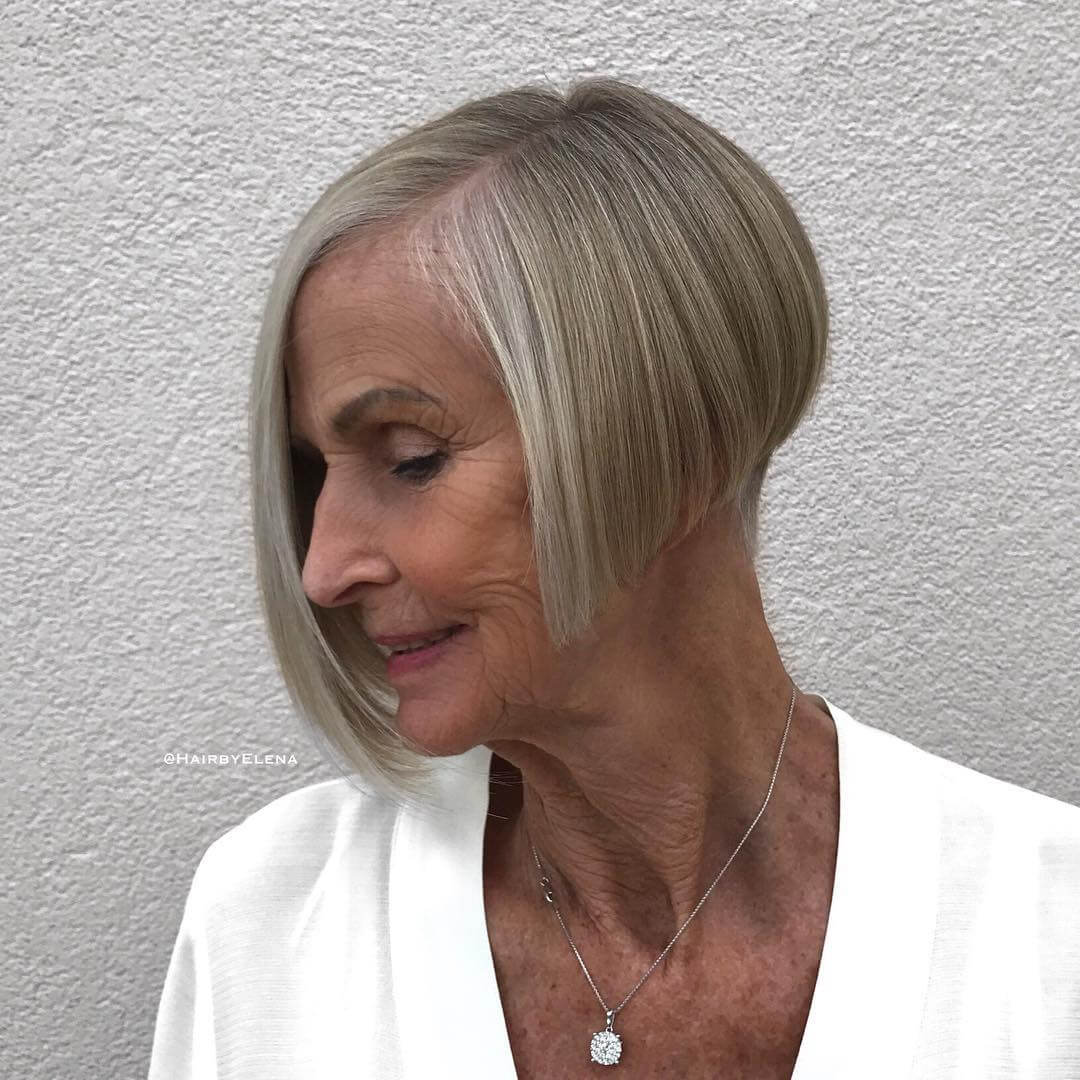 Medium haircuts for women over 60 Asymmetric Angled Side Parted Bob Hairs