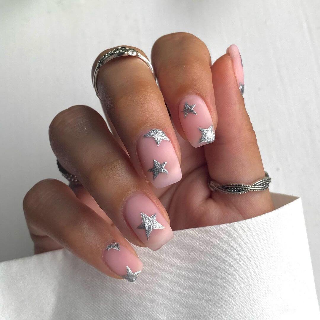 Silver Nail Art Designs Twinkling and silver stars around