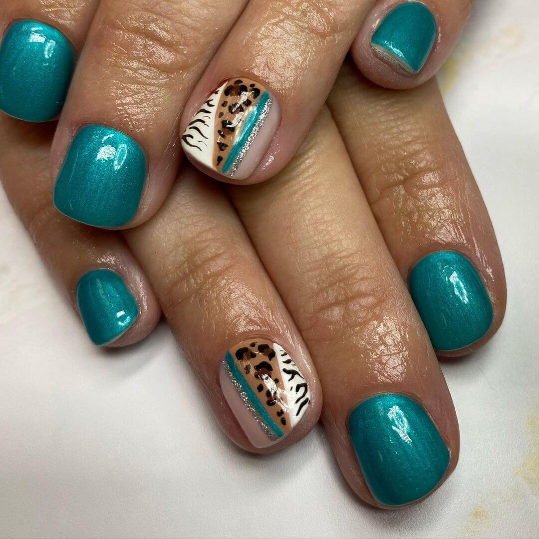 Leopard themed zebra nail art
