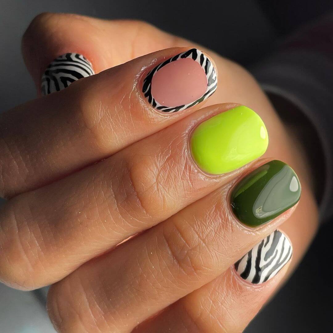 Zebra Nail Art Design Zebra nail art with shades of green