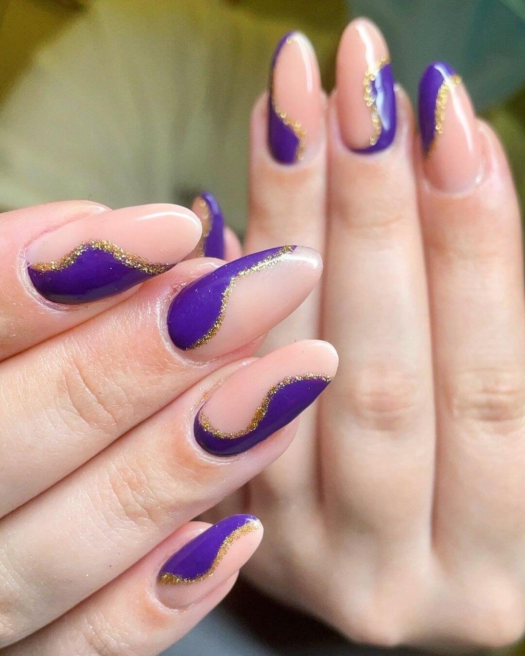 Gold with violet nail art design