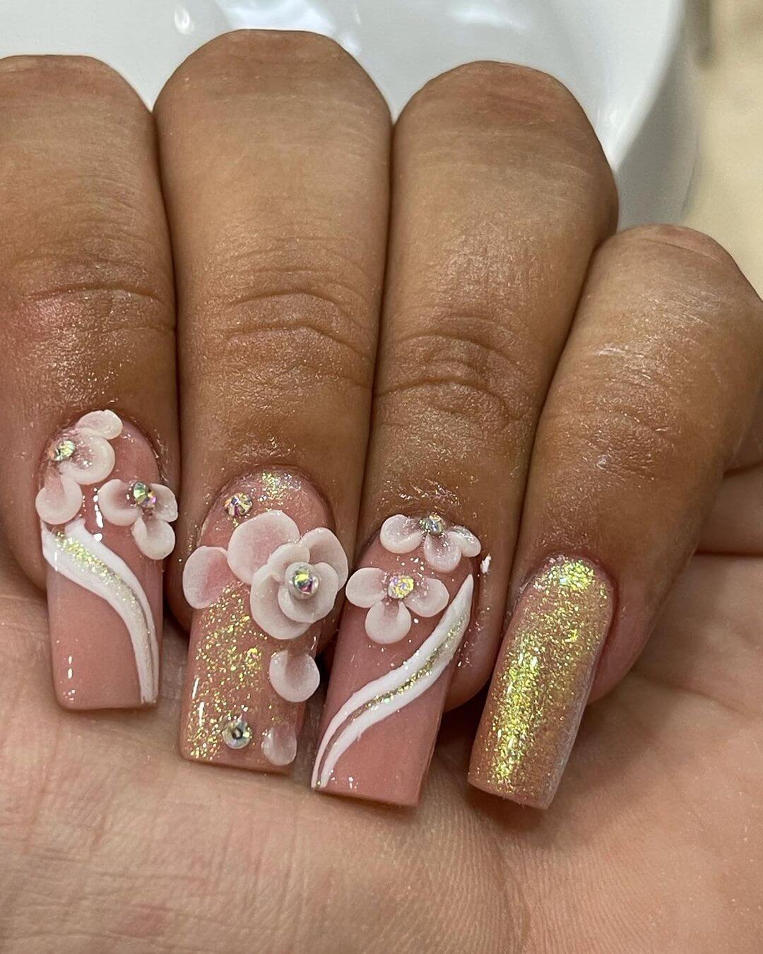 Floral theme gold nail art design