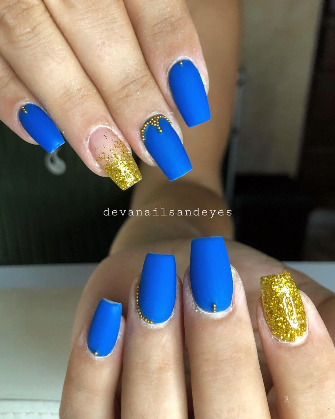 Gold Nail Art Designs Gold with blue nail art design