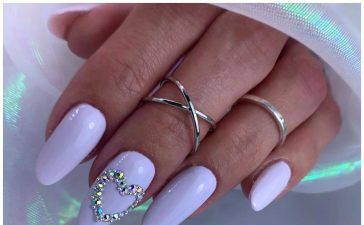 Pastel Blue Nails With Embellished Heart